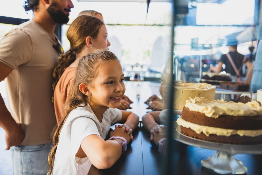 Family ordering some desserts at Cake Boi store in Hamilton, Newcastle. Image Destination NSW