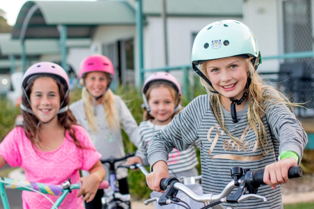 Kids riding bikes at BIG4 Easts Beach Holiday Park