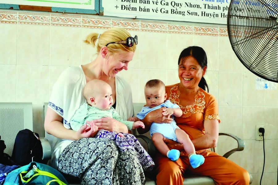 Making friends with a local baby in Quy Nhon. Image: Kyle Rodriguez