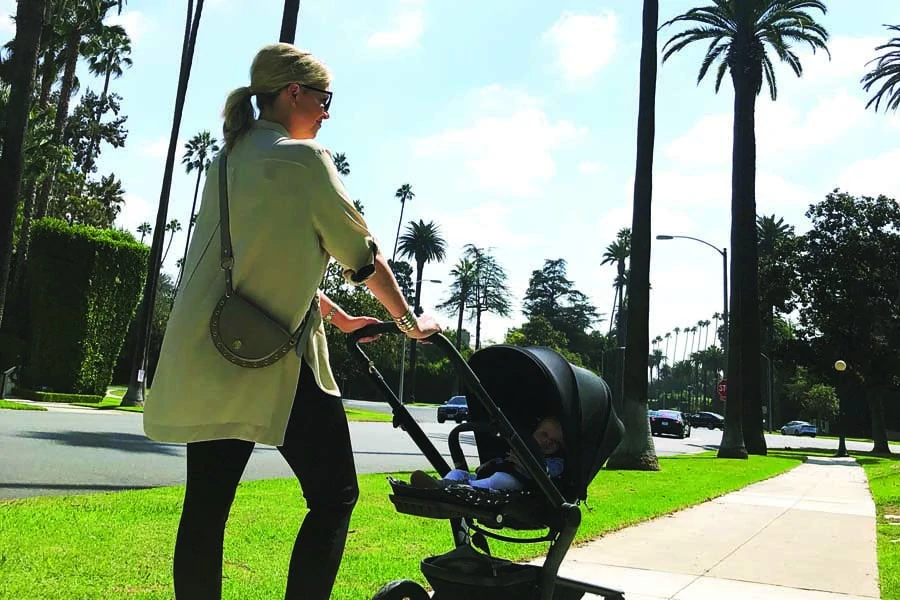 rebecca pushing ruby in the pram in beverly hills when she was a baby