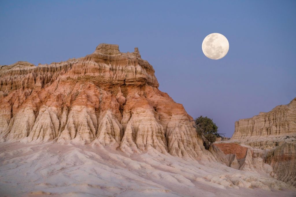 Moon rising over the Walls of China in World Heritage Mungo National Park. Image Destination NSW