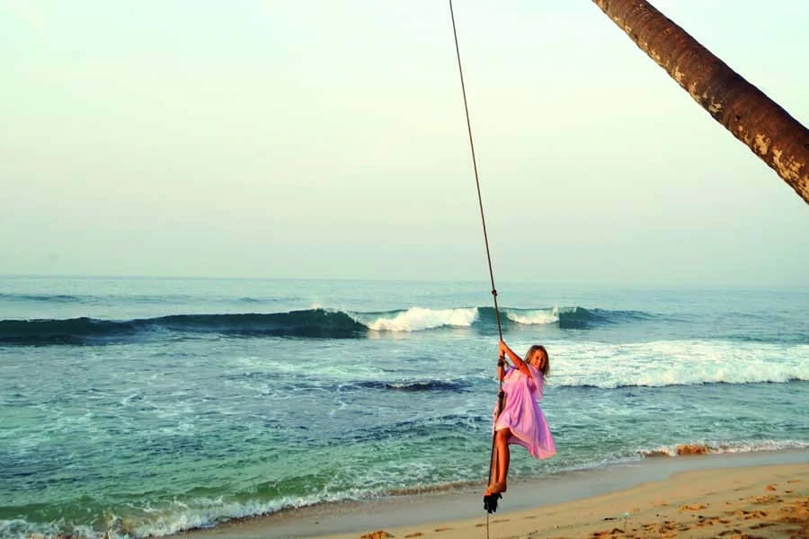 emmie swinging at dalawella beach