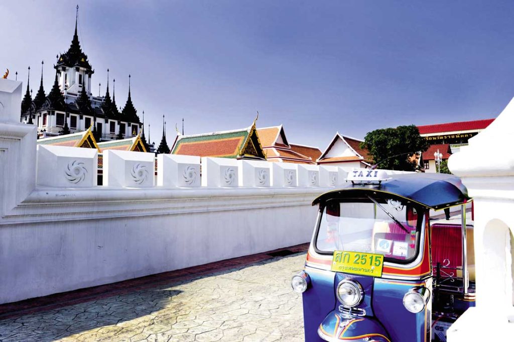 feature a tuk tuk at wat ratchanatdaram in bangkok
