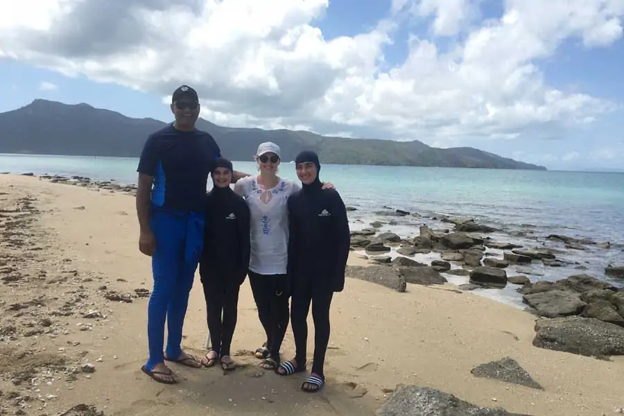 dr monty badami with his daughter aurora wife lara and son baxter on hayman island in queensland