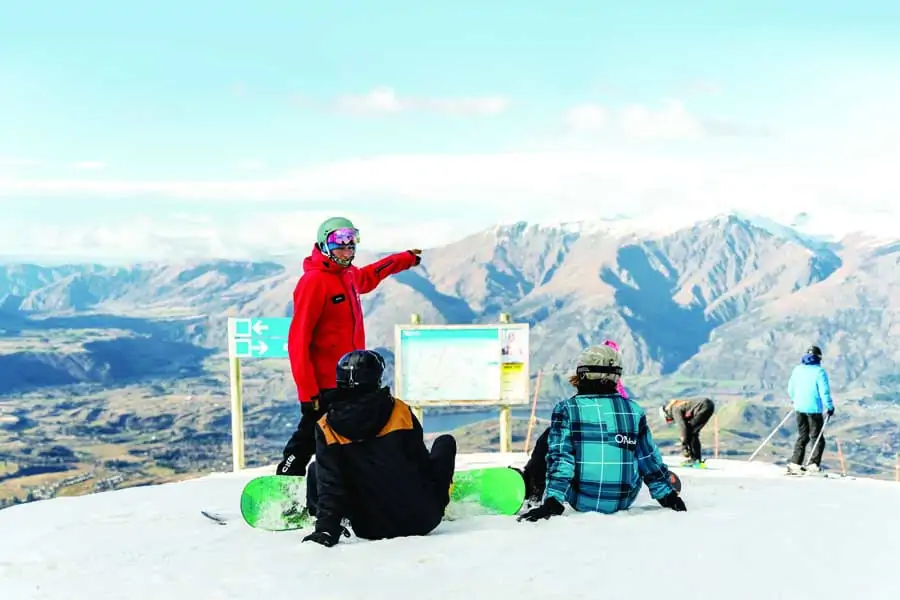 a snowboard lesson at coronet peak