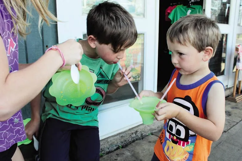 kynan and kobi tasting shave ice in hawaii