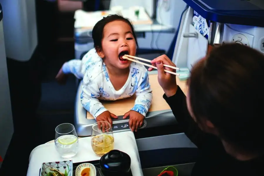 Adam Liaw's family on the plane to Tokyo