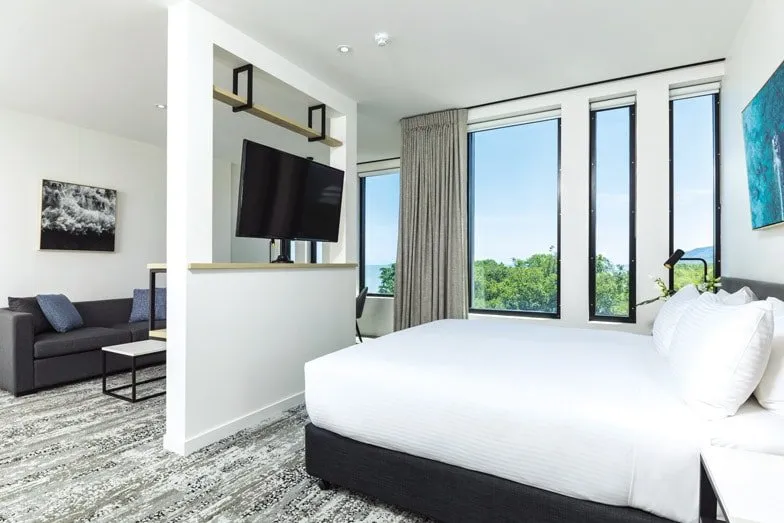 A Deluxe Bedroom at Cairns Oaks Hotel