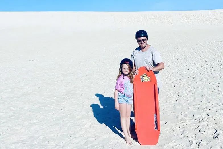 dad and daisy sandboarding on kangaroo island. image meg law
