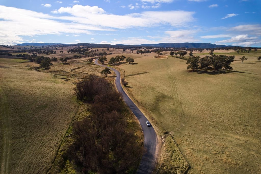 Driving through Bathurst on a road trip. Image Destination NSW