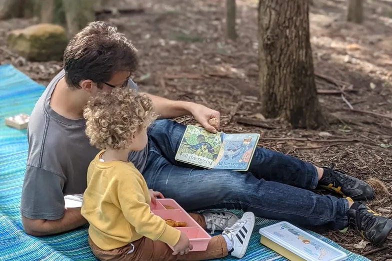 Reading books about nature at a Bush Balance playgroup