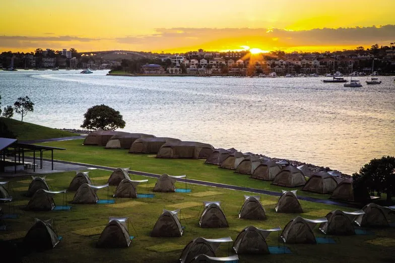 Spend the night in a tent on Cockatoo Island in Sydney Harbour. Image Destination NSW