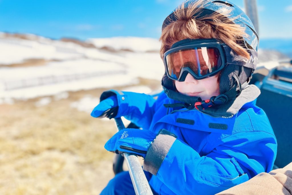 Five year old Jasper on the ski lift at Falls Creek. Image Meg Law