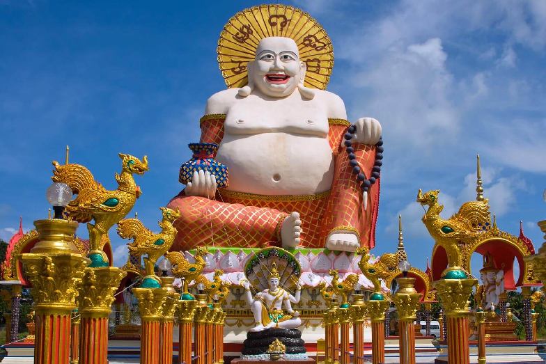 Smiling Buddha of wealth statue
