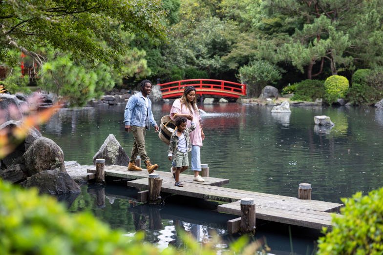 A family at Auburn Botanic Gardens in Sydney. Image: Destination NSW