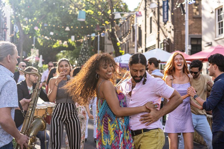 People dancing at The Rocks Market. Image: Destination NSW