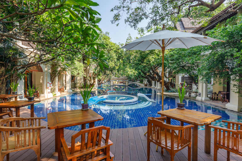 Dine beside the pool at Khum Phaya Resort & Spa