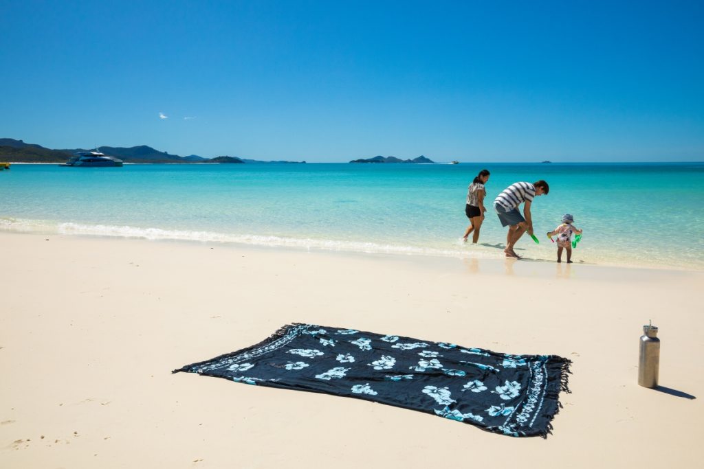 Family with a toddler in the Whitsundays. Image Tourism Whitsundays