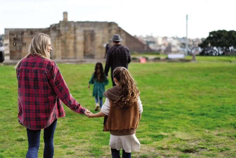 A family exploring Cockatoo Island. Image Destination NSW