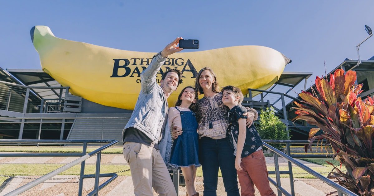 A family taking a selfie at The Big Banana Image Destination NSW featured