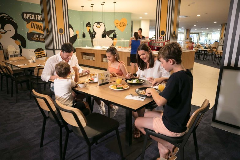 A family dining at Penguins restaurant at Paradise Resort Gold Coast.jpg