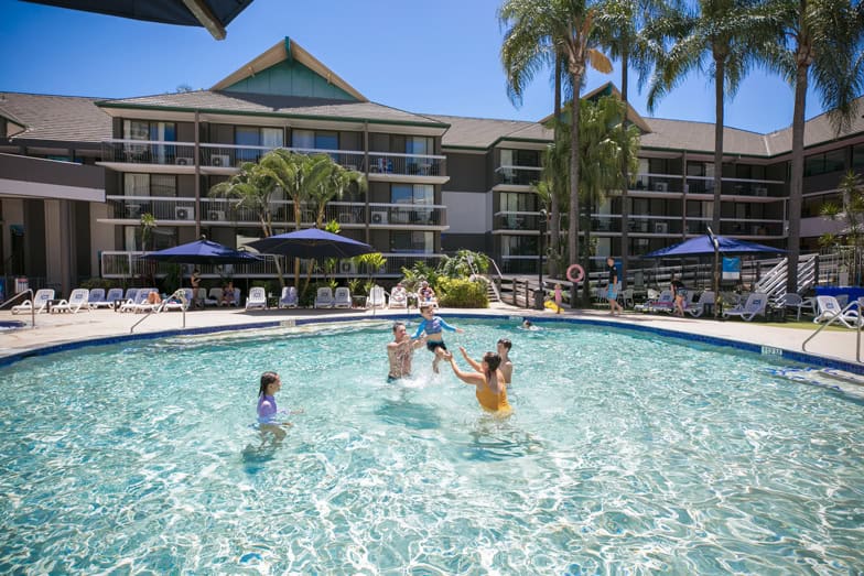 A family in the pool at Paradise Resort Gold Coast.jpg