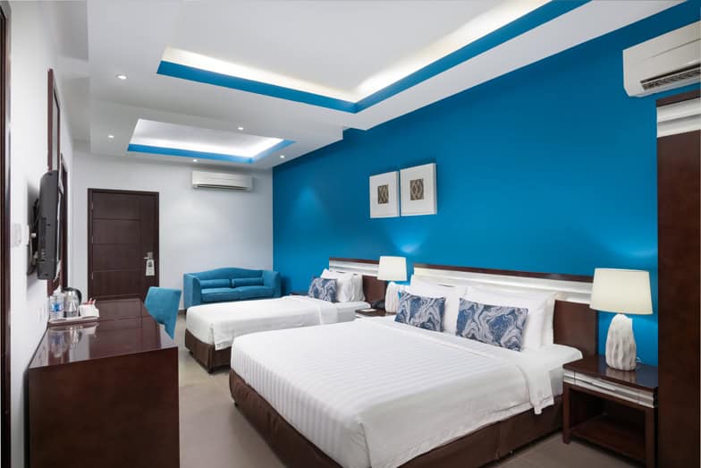 A family room at Al Hail Waves Hotel Managed by Centara in Oman.jpg