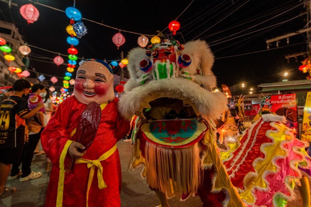 Performers at Nakhon Sawan Pak Nam Pho Chinese New Year Festival. Image Tourism Authority of Thailand (TAT)